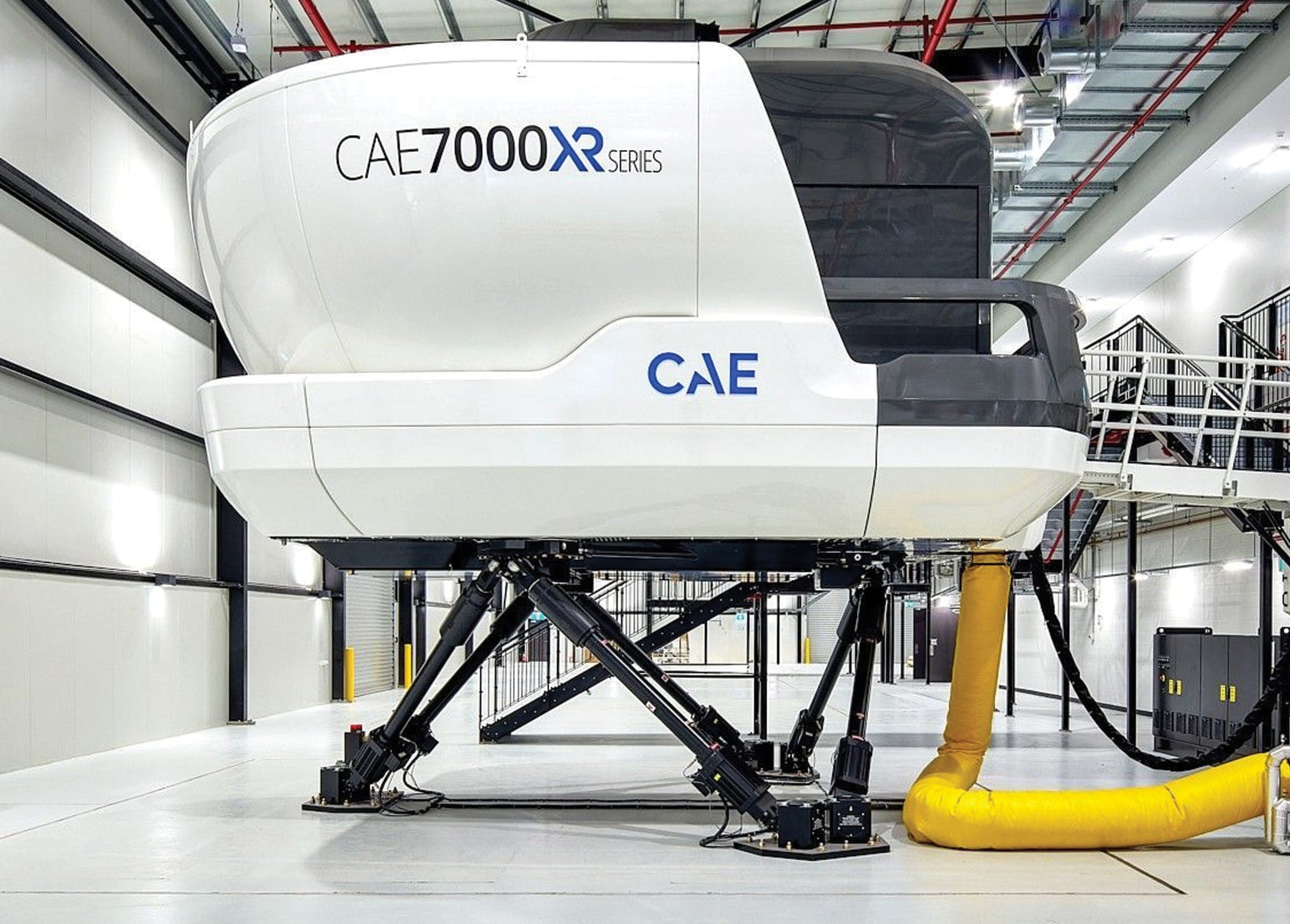 CAE 7000XR full-flight simulator on its motion platform in the training hangar